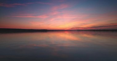 Color sunset over ripple sea lake water, 4K relaxation video
