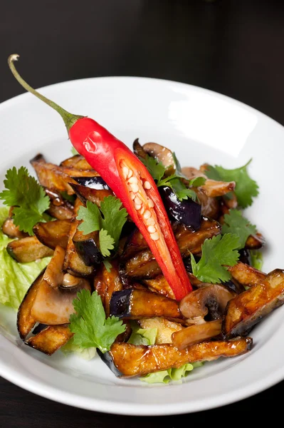 Salad from roasted eggplants Stock Image