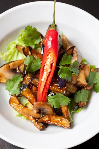 Salad from roasted eggplants Stock Photo