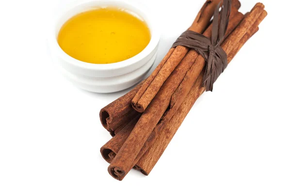 Cinnamon and honey — Stock Photo, Image