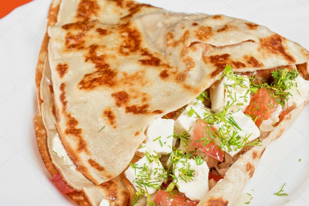 Pancakes with cheese and vegetables