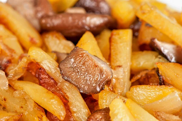 Fried potatoes with mushrooms