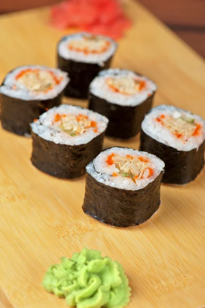 Sushi rolls with tobico and pancake — Stock Photo, Image