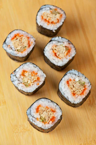 Sushi rolls with tobico and pancake — Stock Photo, Image