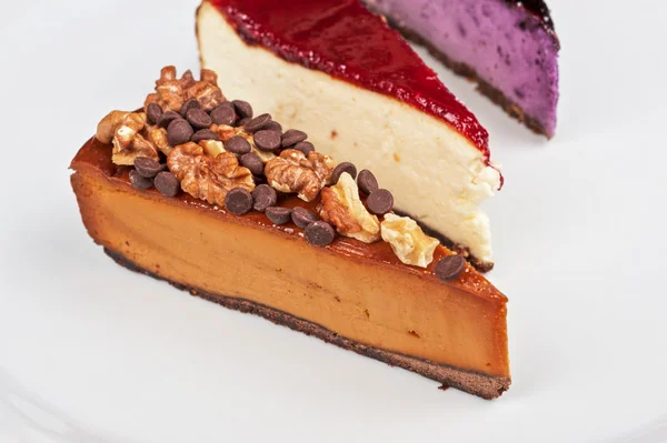 Cheesecake with chocolate and nuts — Stock Photo, Image