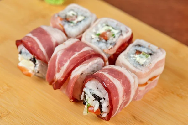 Sushi roll with bacon — Stock Photo, Image