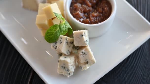 Cheese plate closeup — Stock Video