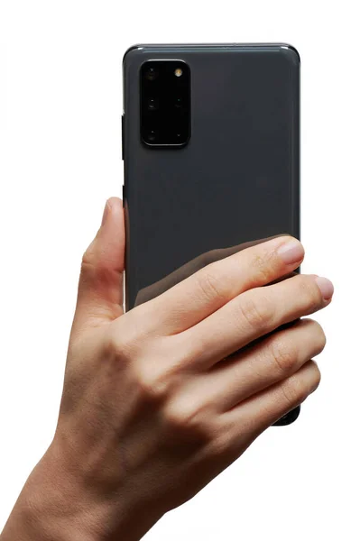 Smartphone Hand Back View Camera Isolated Studio Background Royalty Free Stock Images