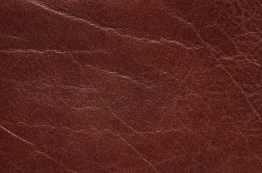 Dark brown rough leather texture macro close up view