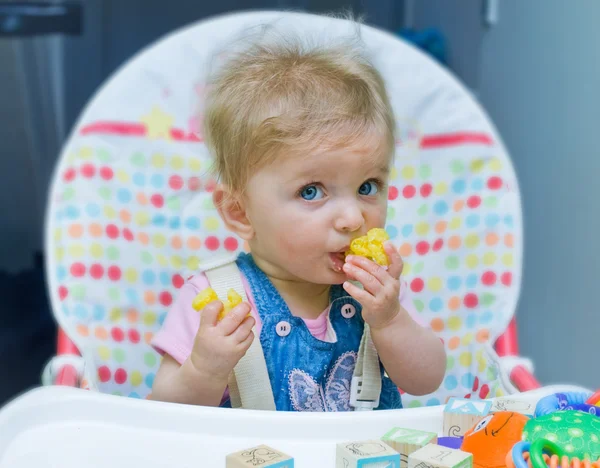 Baby girl eating — Stock Photo, Image