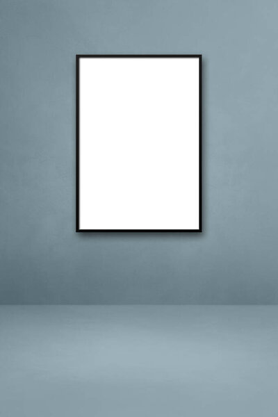 Black picture frame hanging on a grey wall. Blank mockup template