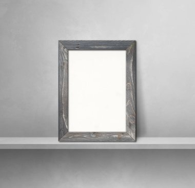 Gri bir rafa yaslanmış ahşap resim çerçevesi. 3 boyutlu illüstrasyon. Boş model şablonu. Kare arkaplan