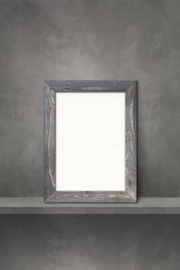 Gri bir rafa yaslanmış ahşap resim çerçevesi. 3 boyutlu illüstrasyon. Boş model şablonu. Dikey arkaplan