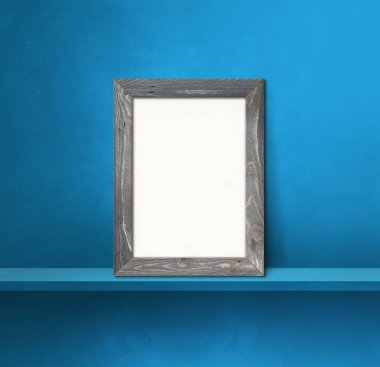 Mavi bir rafa yaslanmış ahşap resim çerçevesi. 3 boyutlu illüstrasyon. Boş model şablonu. Kare arkaplan