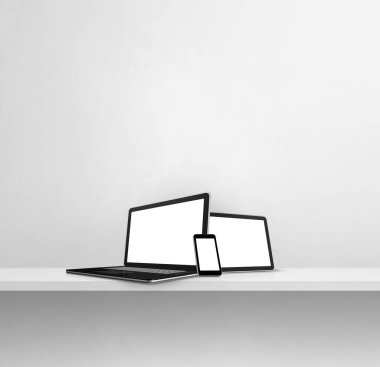 Laptop, cep telefonu ve dijital tablet beyaz beton duvar rafında. Kare arka plan. 3B Görüntü