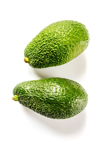 Twee Verse Avocado Geïsoleerd Een Witte Achtergrond — Stockfoto