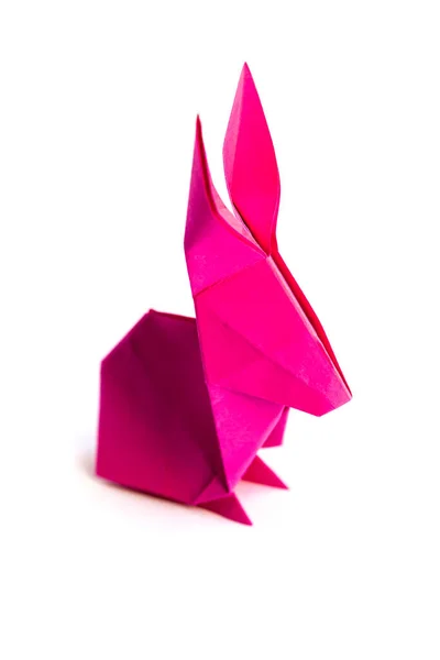 白地に隔離されたピンクの紙のウサギの折り紙 — ストック写真