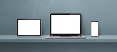 Gri duvar rafında dizüstü bilgisayar, cep telefonu ve dijital tablet bilgisayar var. Afiş arka planı. 3B Görüntü