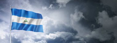 Nicaragua flag on a cloudy sky, three dimensional render