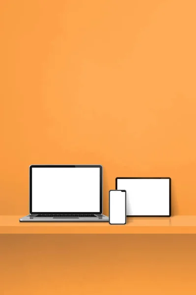 Ноутбук Мобильный Телефон Цифровой Планшет Полке Оранжевой Стены Вертикальный Фон — стоковое фото