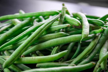Fresh organic green beans closeup view. Food background