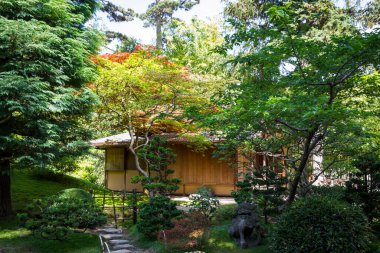 Old traditional wood house in a japanese garden. Zen background