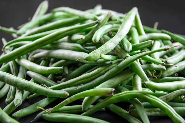 Fresh organic green beans closeup view. Food background