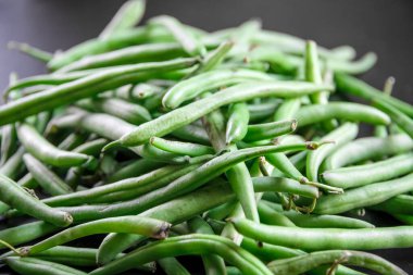 Fresh organic green beans closeup view. Food background