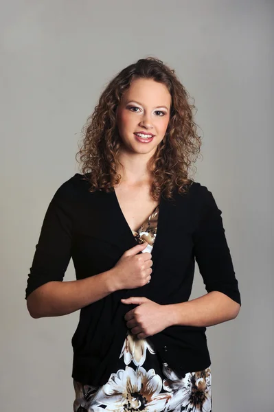 Young model posed on grey background — Stock Photo, Image