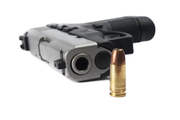 Pistol med ammunition Stockfoto