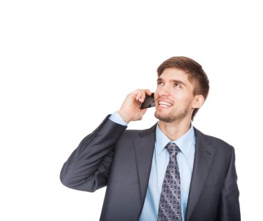 İş adamı cep telefonuyla konuşuyor.