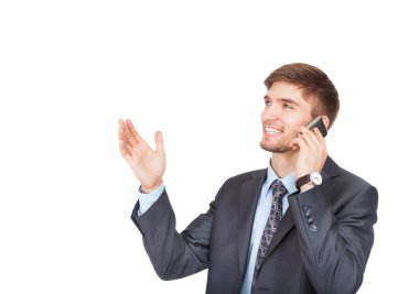İş adamı cep telefonuyla konuşuyor.