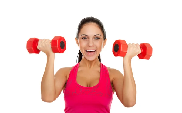 Young healthy girl doing exercises with dumbbells — Stock Photo, Image