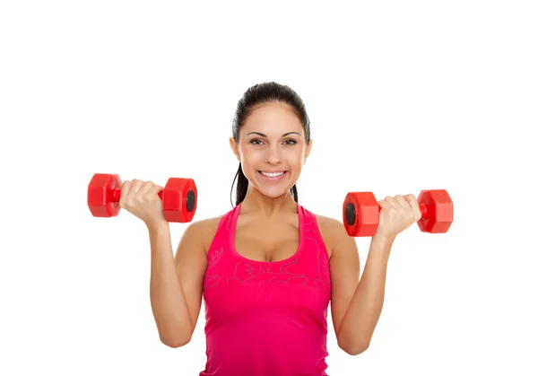 Young healthy girl doing exercises with dumbbells — Stock Photo, Image