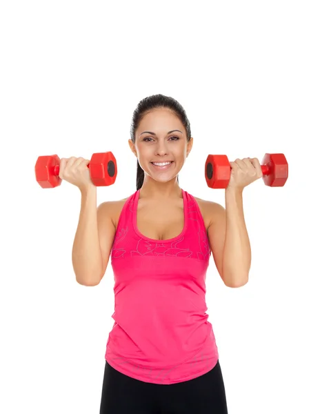 Young healthy girl doing exercises with dumbbells — Stock Photo, Image