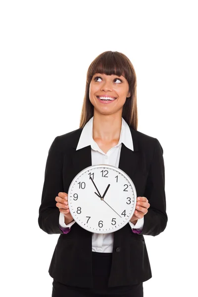 Hermosa mujer sonriente sosteniendo reloj grande —  Fotos de Stock