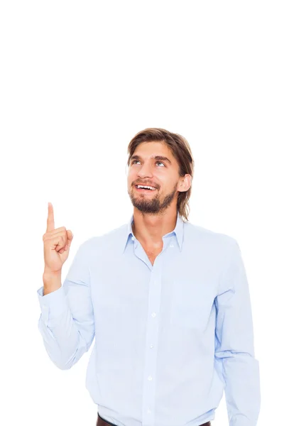 Knappe jonge business man gelukkig glimlach punt vinger naar de lege kopie ruimte — Stockfoto