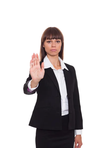 Vakava liike nainen tekee stop hand merkki — kuvapankkivalokuva