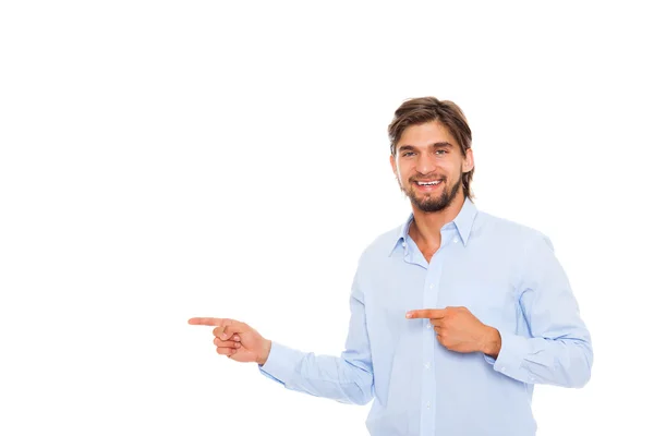 Bonito jovem homem de negócios feliz sorriso apontar dedo para espaço de cópia vazio — Fotografia de Stock