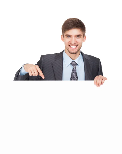 Бізнесмен тримає чисту білу карткову дошку — стокове фото