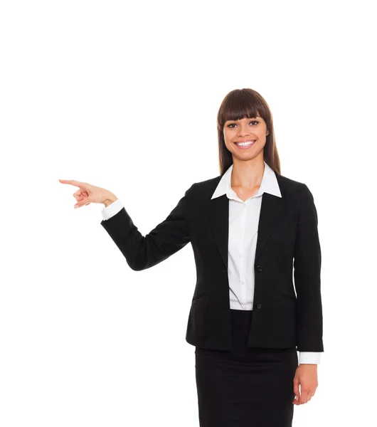 Businesswoman smile point finger to empty copy space — Stock Photo, Image