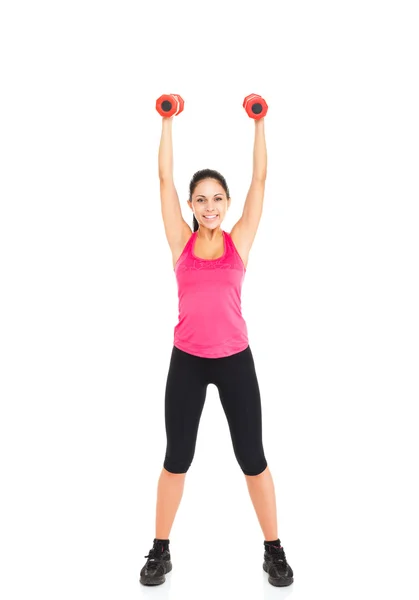 Young healthy girl doing exercises with dumbbells — Stock Photo, Image