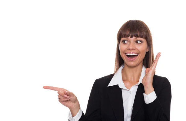 Businesswoman smile point finger to empty copy space Stock Picture