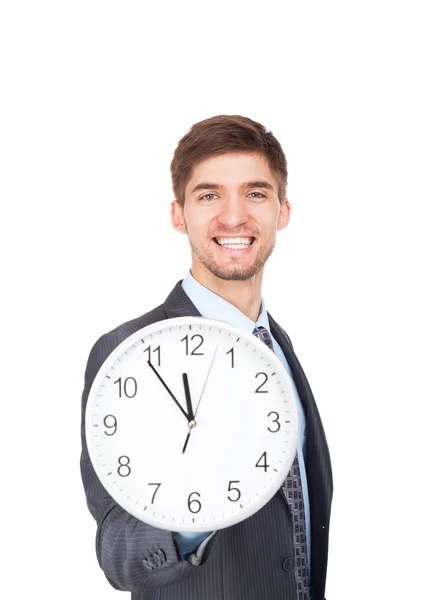 Businessman hold clock Stock Image