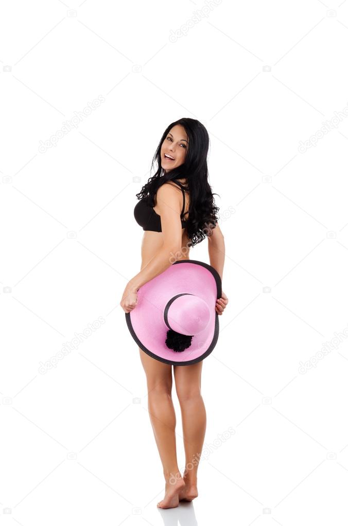 Young woman smile wearing summer beach hat and bikini cover ass