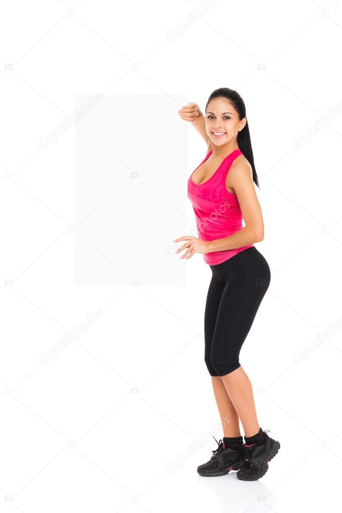 Sport fitness woman hold blank board advertisement with empty copy space