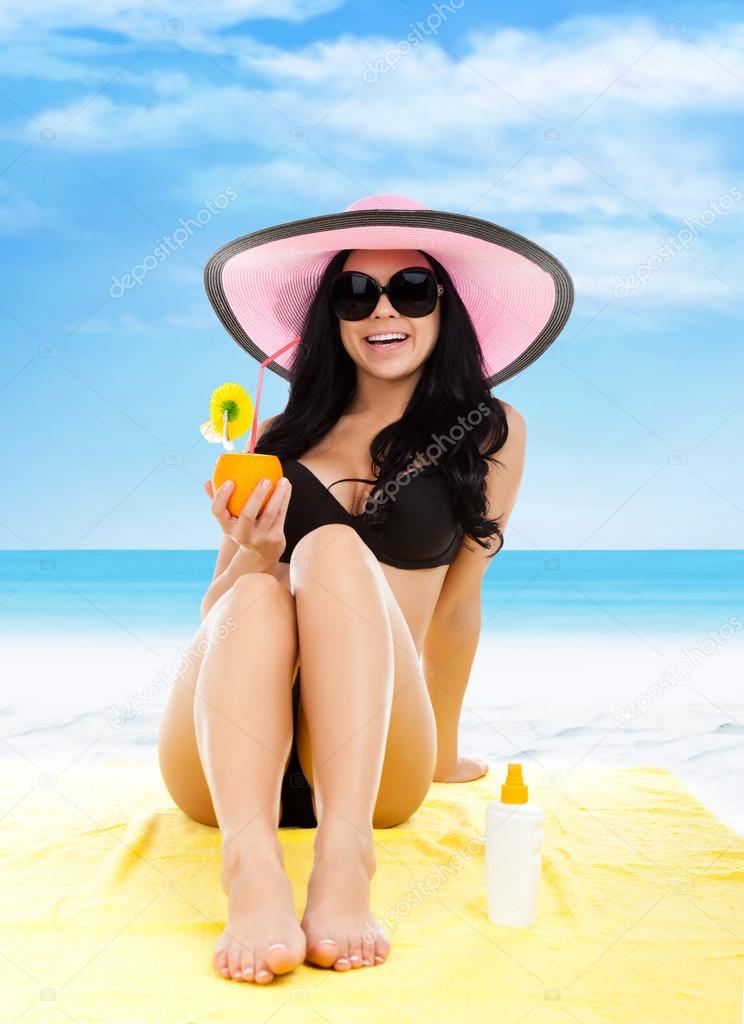 Happy woman smile on beach, sun tanned body legs