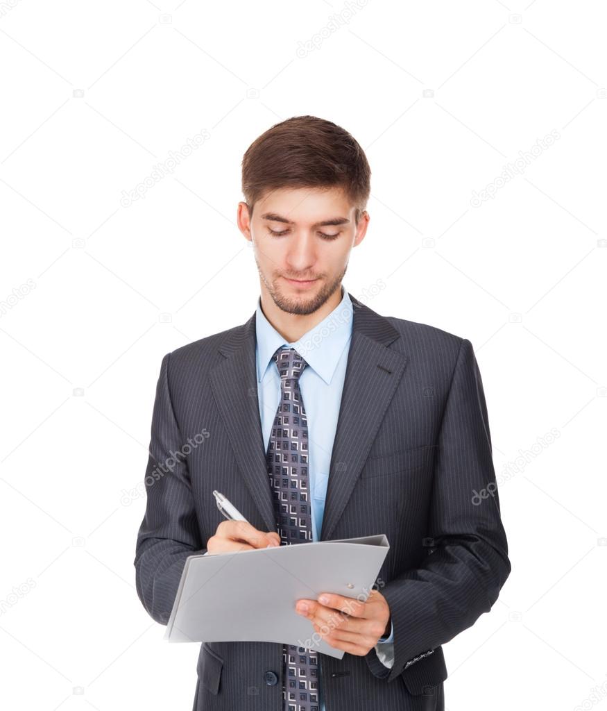 Young business man serious writing on clipboard