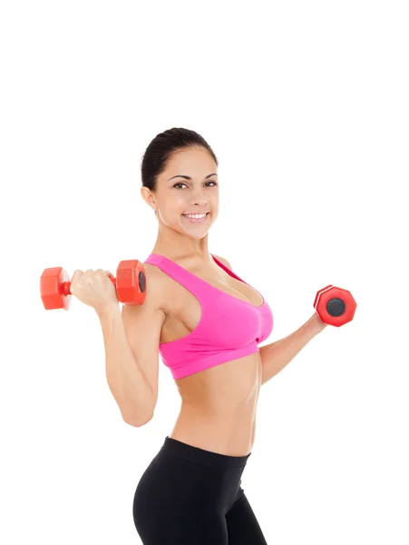 Young girl doing exercises with dumbbells — Stock Photo, Image