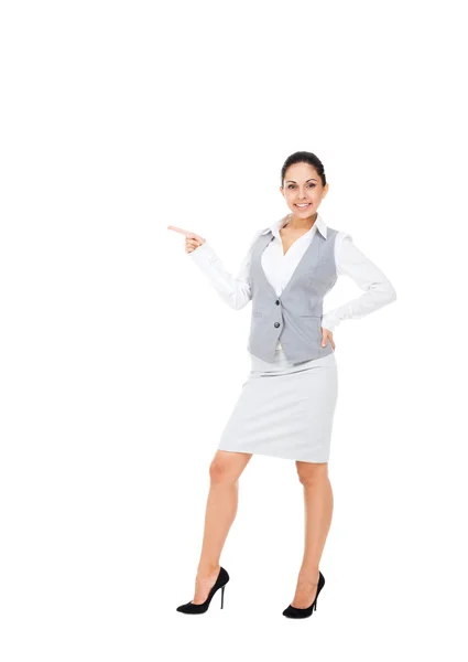 Businesswoman pointing to copy space — Stock Photo, Image